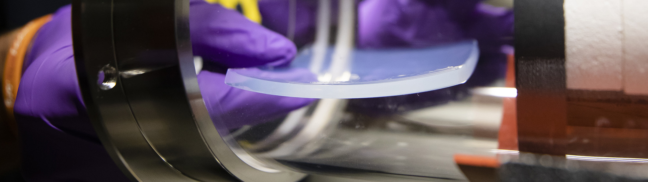 A hand holding the heat-trapping aerogel